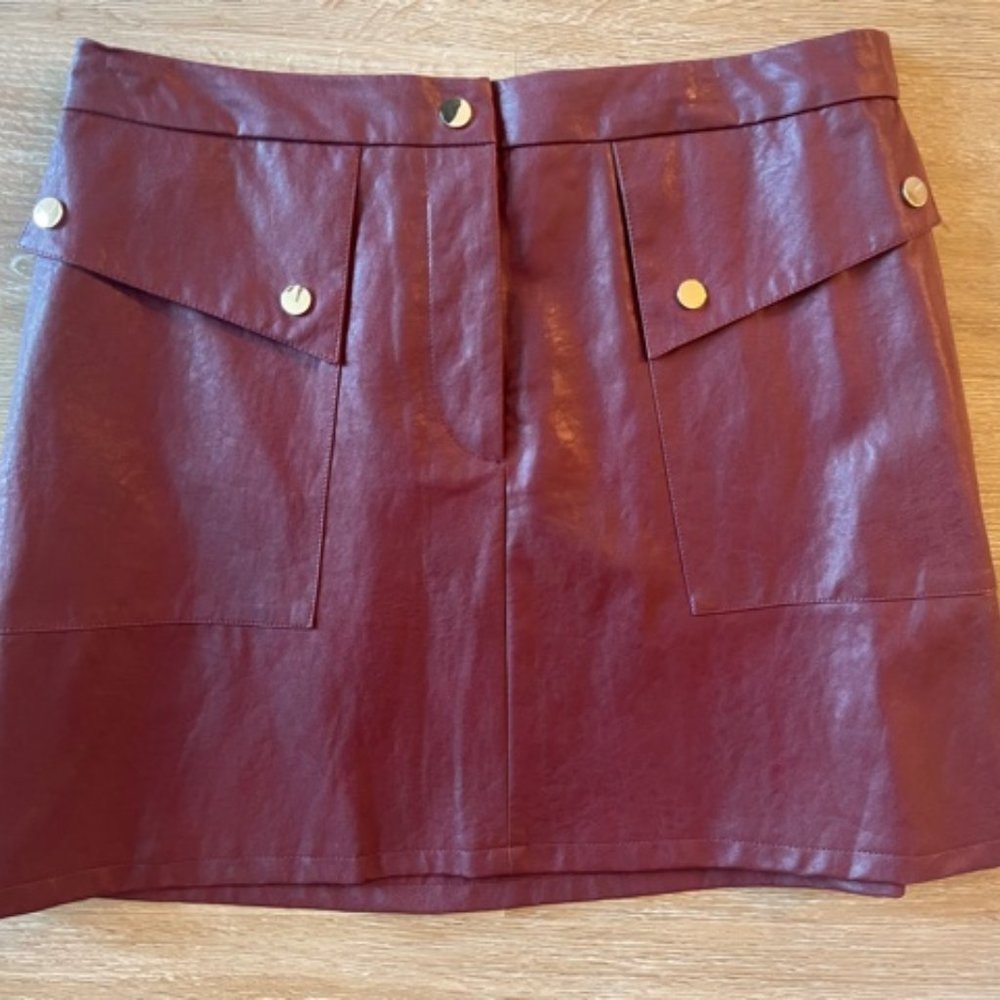 Faux Leather red skirt with gold buttons from Zara